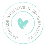 Round logo stating "Handmade with Love in Ruckersville, Va." with a teal heart in the center.