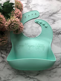 Mint Silicone toddler Bib with food catching pocket "personalized" laser engraved with child's name in cursive script