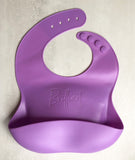 Purple Silicone toddler Bib with food catching pocket "personalized" laser engraved with child's name in cursive script