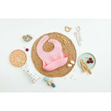 Pink silicone bib laser engraved with the name Sophia on textured charger by Legacy and Light