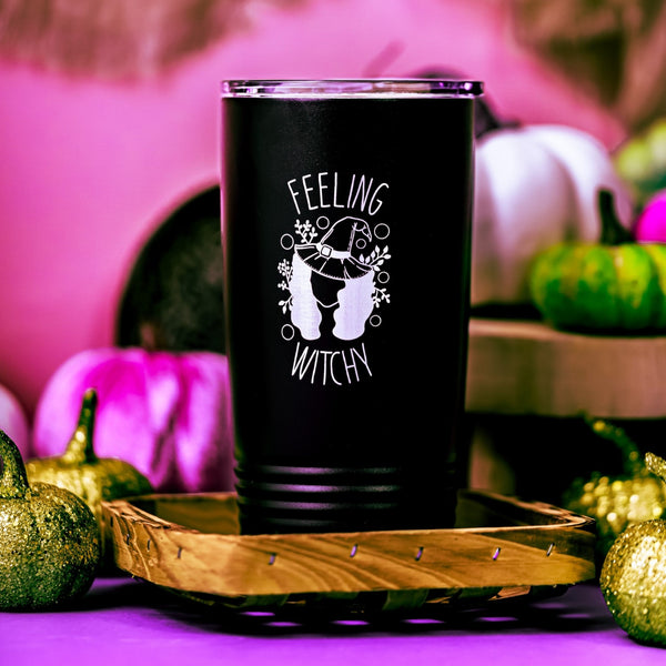 Black Stainless steel tumbler with Feeling Witchy laser engraved into the powder coat