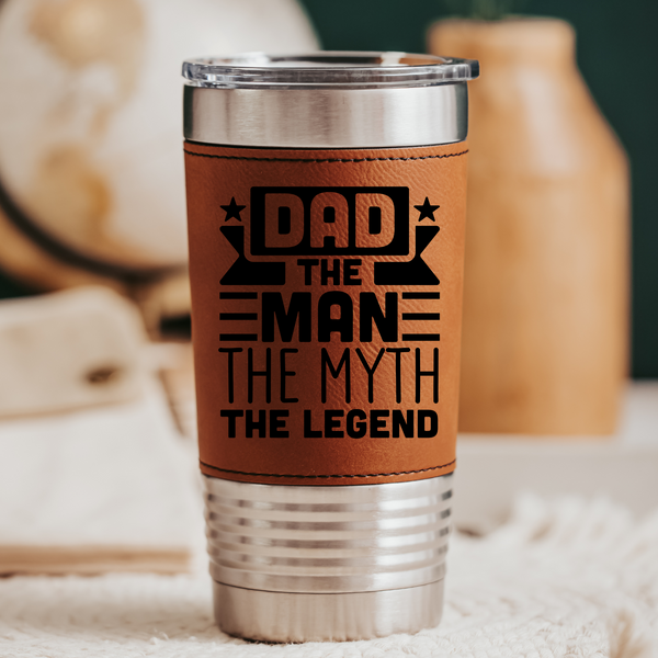 Stainless steel tumbler with leatherette wrap with Dad, the Man, the myth, the legend laser engraved 