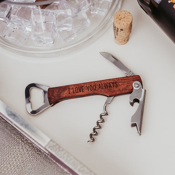 Wine opener multi tool engraved with I love you always with wine cork and ice cubes in the background by Legacy and Light