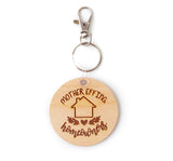 Wooden Key chain with writing "Mother Effing Home Owners" with a house in the middle