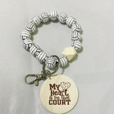Volleyball beaded keychain with wooden disk with 'My Heart is on that Court' volleyball design laser engraved by Legacy and Light