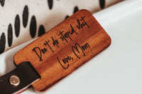 Wooden Engraved Don't Do stupid shit keychain on white background by Legacy and Light