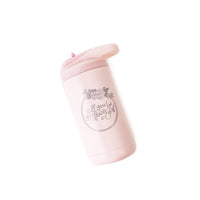 Matte blush twelve-ounce cold drink tumbler with flip up straw and the front is laser engraved with "Will You be my Flower Girl?" encircled with a flower wreath border.