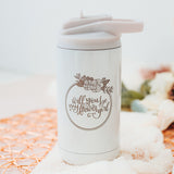 opalescent white twelve-ounce hot and cold drink tumbler with flip up straw and the front is laser engraved with "Will You be my Flower Girl?" encircled with a flower wreath border.